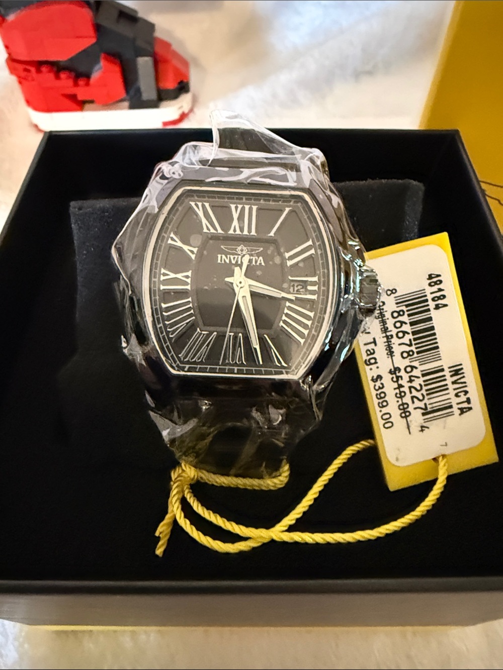 Invicta Black and Silver Roman Numeral Tonneau Watch Ladies